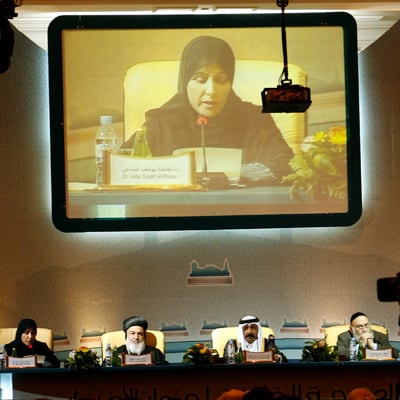 Aisha Yussef al-Mannai speaks at the opening of the Fifth Doha Conference for Inter-Faith Dialogue in Doha