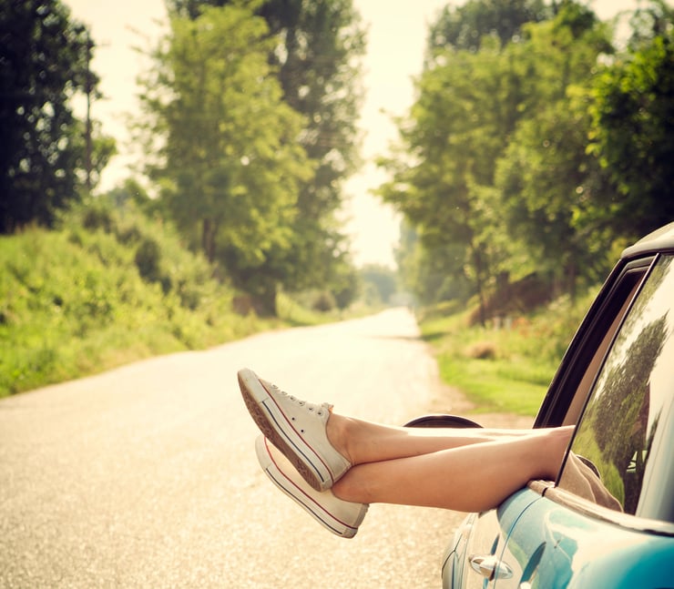 "girl resting on the side of a road and stretching her legs out the window, on a hot summer day :)SIMILAR IMAGE:"